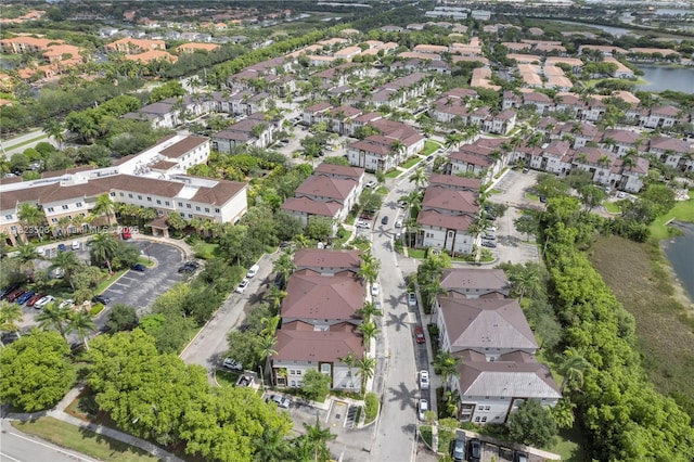 4445 SW 160th Ave Unit 102, Miramar, FL 33027 - aerial overview of property's location with a large body of water and nearby suburban area