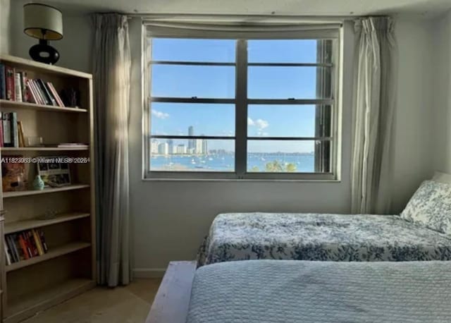 5 Island Ave Unit 5G, Miami Beach, FL 33139 - bedroom featuring multiple windows