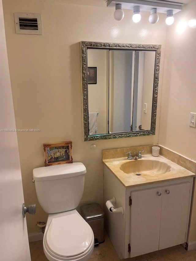 5 Island Ave Unit 5G, Miami Beach, FL 33139 - bathroom featuring toilet and vanity