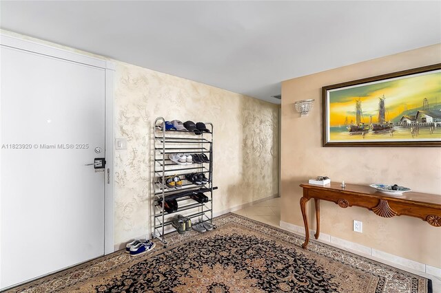 250 174th St Unit 1704, Sunny Isles Beach, FL 33160 - hallway featuring baseboards