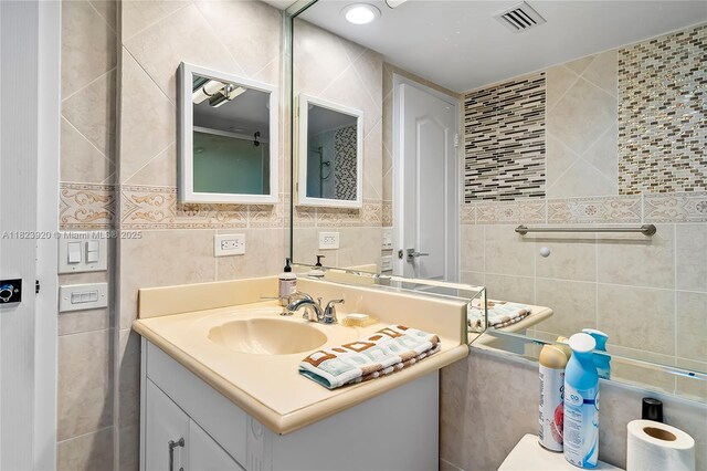 250 174th St Unit 1704, Sunny Isles Beach, FL 33160 - bathroom with tile walls and vanity
