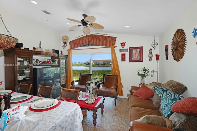 1585 SE 20th Rd, Homestead, FL 33035 - living room featuring a water view, a ceiling fan, recessed lighting, tile patterned floors, and lofted ceiling