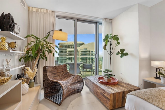 4111 S Ocean Dr Unit 3709, Hollywood, FL 33019 - sitting room with tile patterned floors and a wall of windows