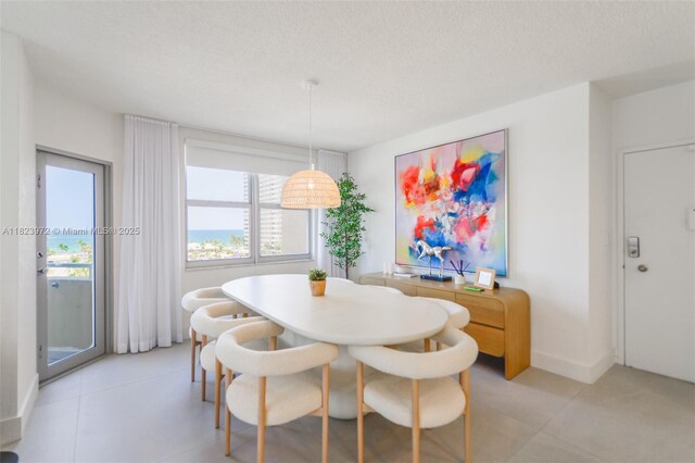 1965 S Ocean Dr Unit 6F, Hallandale Beach, FL 33009 - dining space with a textured ceiling