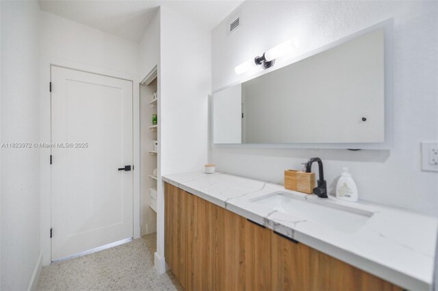 1965 S Ocean Dr Unit 6F, Hallandale Beach, FL 33009 - bathroom with vanity and speckled floor