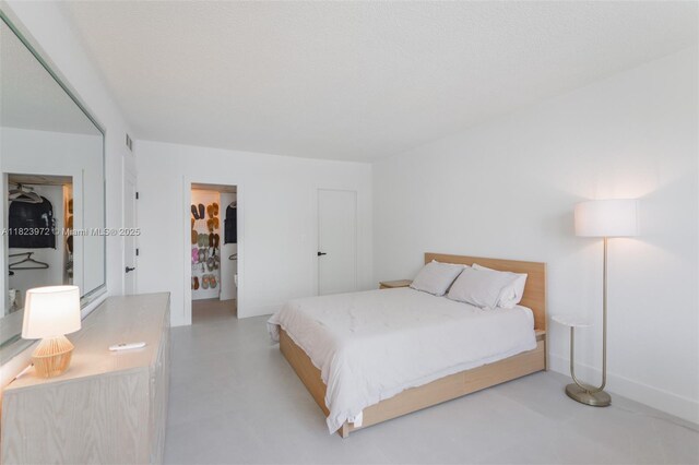 1965 S Ocean Dr Unit 6F, Hallandale Beach, FL 33009 - bedroom featuring baseboards