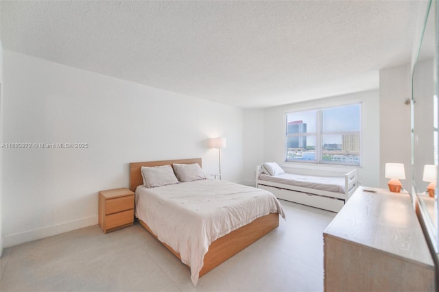 1965 S Ocean Dr Unit 6F, Hallandale Beach, FL 33009 - bedroom featuring a textured ceiling