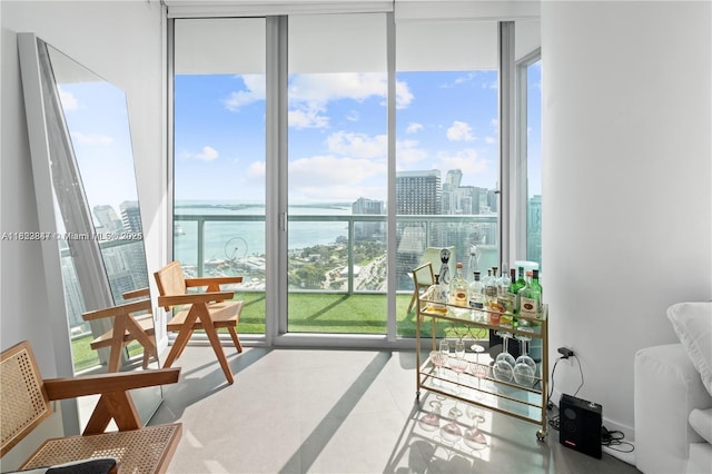888 Biscayne Blvd Unit 4801, Miami, FL 33132 - sunroom / solarium featuring a water view and a view of city