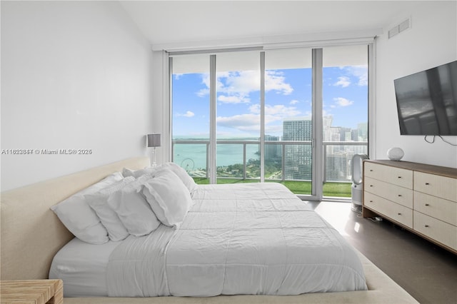 888 Biscayne Blvd Unit 4801, Miami, FL 33132 - bedroom featuring floor to ceiling windows and multiple windows