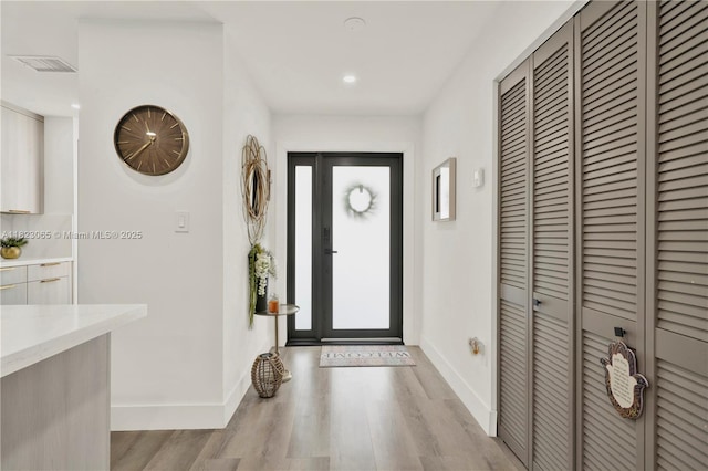 9905 NW 52nd Ln, Doral, FL 33178 - entrance foyer featuring light wood-style flooring and recessed lighting