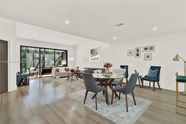 9905 NW 52nd Ln, Doral, FL 33178 - dining room with light wood-style floors and recessed lighting