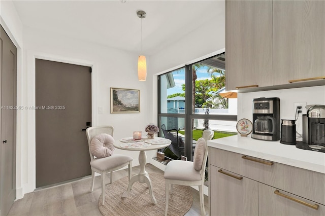 9905 NW 52nd Ln, Doral, FL 33178 - dining area with light wood-style floors
