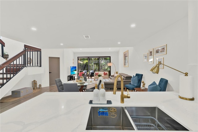 9905 NW 52nd Ln, Doral, FL 33178 - kitchen with open floor plan, recessed lighting, and light stone counters