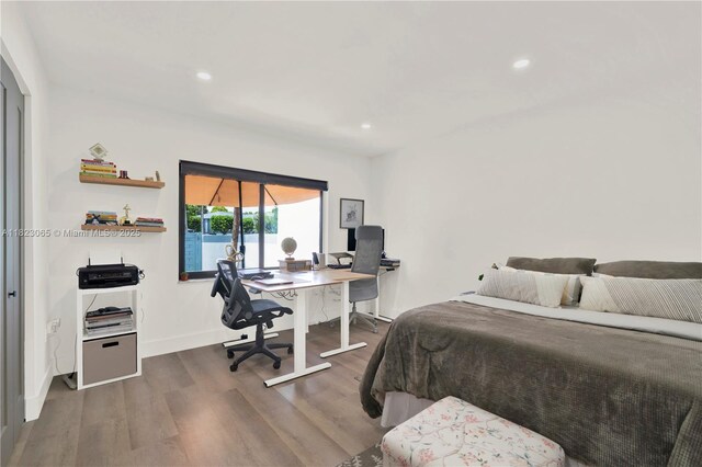 9905 NW 52nd Ln, Doral, FL 33178 - bedroom featuring a desk, wood finished floors, and recessed lighting