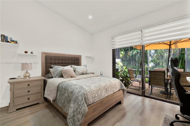 9905 NW 52nd Ln, Doral, FL 33178 - bedroom with access to exterior, light wood-style flooring, lofted ceiling, and recessed lighting