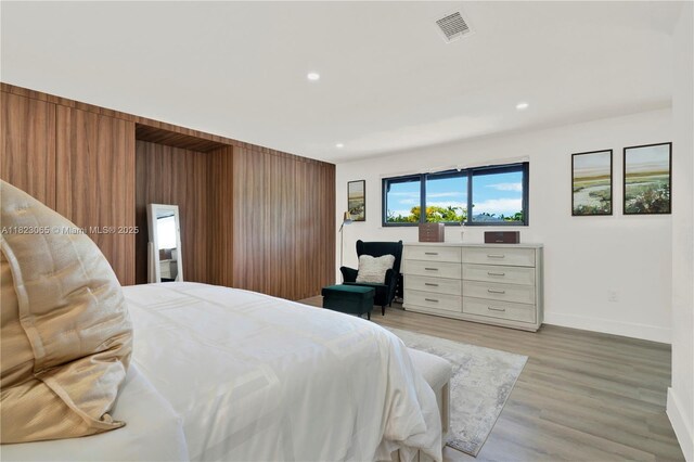 9905 NW 52nd Ln, Doral, FL 33178 - bedroom with recessed lighting and light wood-style floors