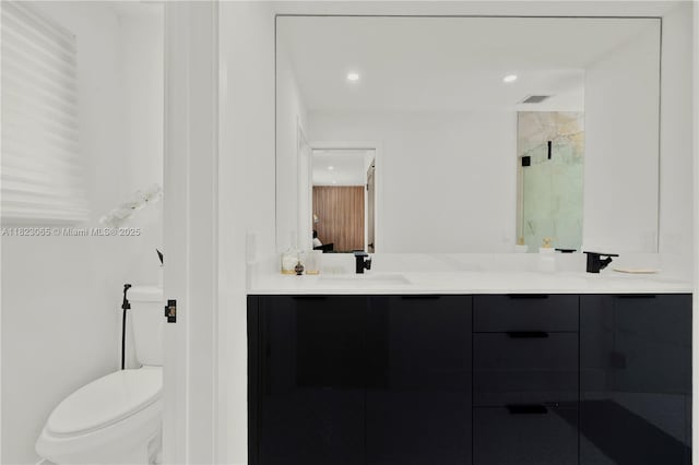 9905 NW 52nd Ln, Doral, FL 33178 - bathroom featuring double vanity, a stall shower, and recessed lighting