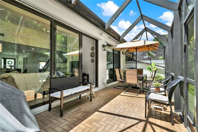 9905 NW 52nd Ln, Doral, FL 33178 - sunroom with outdoor dining area