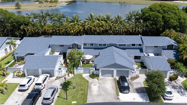 9905 NW 52nd Ln, Doral, FL 33178 - aerial perspective of suburban area with a nearby body of water