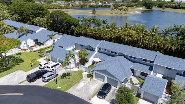 9905 NW 52nd Ln, Doral, FL 33178 - aerial perspective of suburban area featuring a nearby body of water