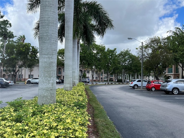 2931 SE 12th Rd Unit 201-55, Homestead, FL 33035 - view of asphalt road with street lighting