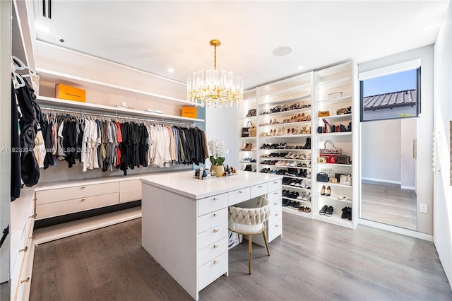 450 W 62nd St, Miami Beach, FL 33140 - walk in closet with wood finished floors and a chandelier