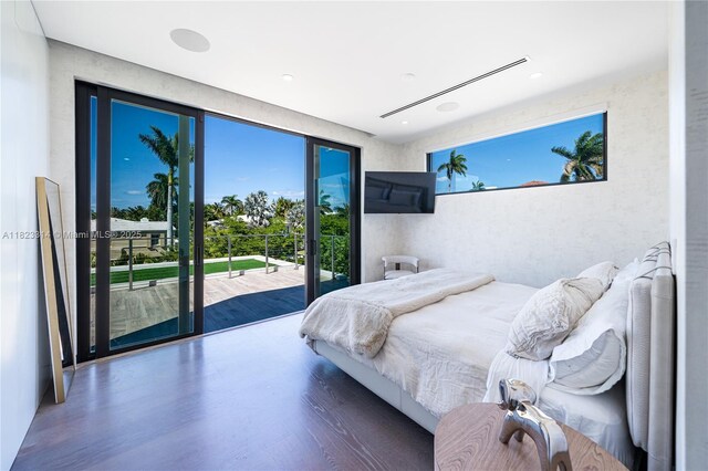 450 W 62nd St, Miami Beach, FL 33140 - bedroom featuring access to exterior, wood finished floors, and recessed lighting