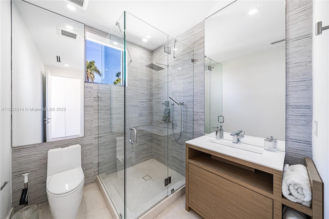 450 W 62nd St, Miami Beach, FL 33140 - full bath featuring vanity, a shower stall, and tile walls