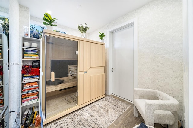 450 W 62nd St, Miami Beach, FL 33140 - living area with wallpapered walls and wood finished floors