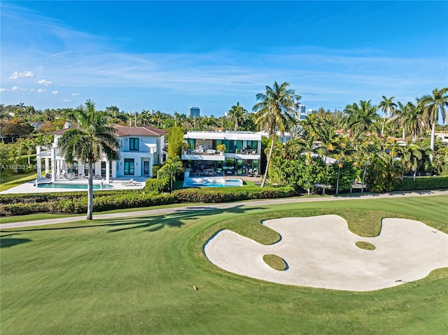 450 W 62nd St, Miami Beach, FL 33140 - view of home's community featuring a lawn, golf course view, and a pool
