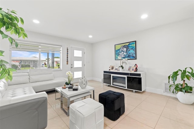 131 NW 31st Ct, Pompano Beach, FL 33064 - living room with light tile patterned floors and recessed lighting