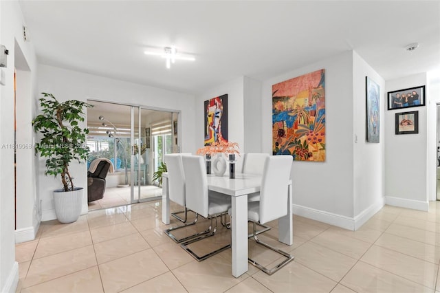 131 NW 31st Ct, Pompano Beach, FL 33064 - dining room with light tile patterned floors