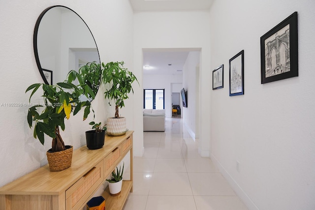 14659 SW 23rd Ter, Miami, FL 33175 - corridor with light tile patterned flooring and baseboards