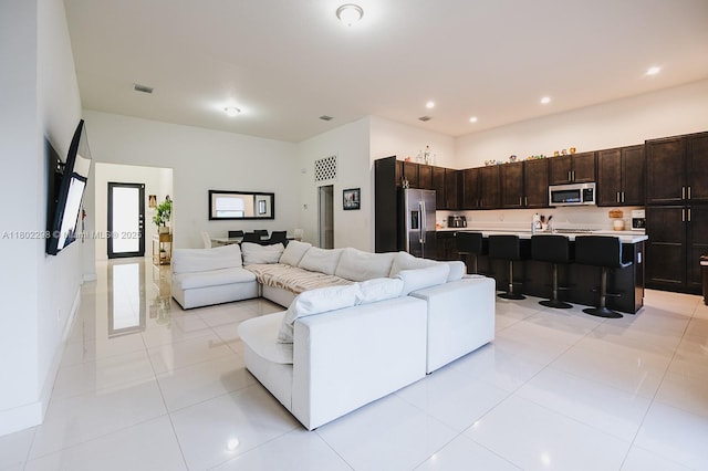 14659 SW 23rd Ter, Miami, FL 33175 - living area featuring light tile patterned flooring and recessed lighting