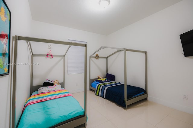 14659 SW 23rd Ter, Miami, FL 33175 - tiled bedroom featuring baseboards