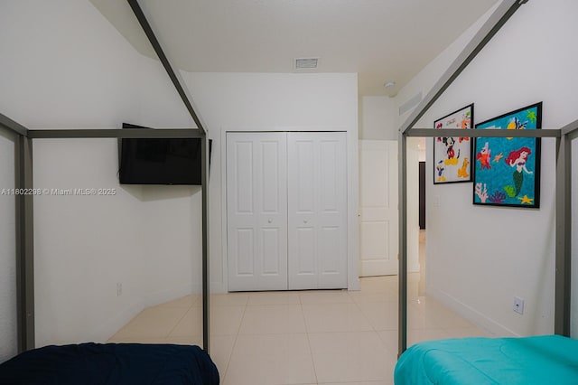 14659 SW 23rd Ter, Miami, FL 33175 - bedroom featuring light tile patterned floors and a closet
