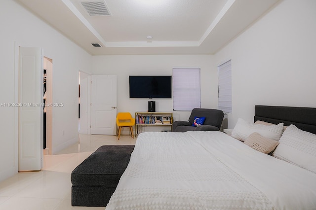 14659 SW 23rd Ter, Miami, FL 33175 - bedroom featuring a tray ceiling and light tile patterned floors