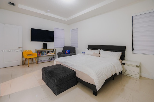 14659 SW 23rd Ter, Miami, FL 33175 - bedroom featuring light tile patterned floors and a raised ceiling