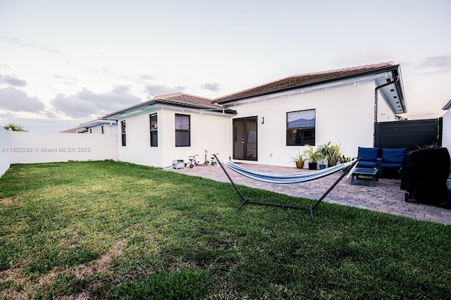 14659 SW 23rd Ter, Miami, FL 33175 - rear view of property featuring a patio area, stucco siding, and a tiled roof