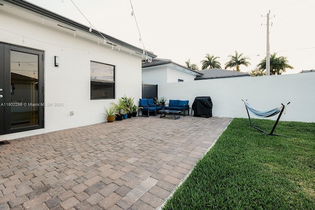 14659 SW 23rd Ter, Miami, FL 33175 - view of patio with a grill and outdoor lounge area
