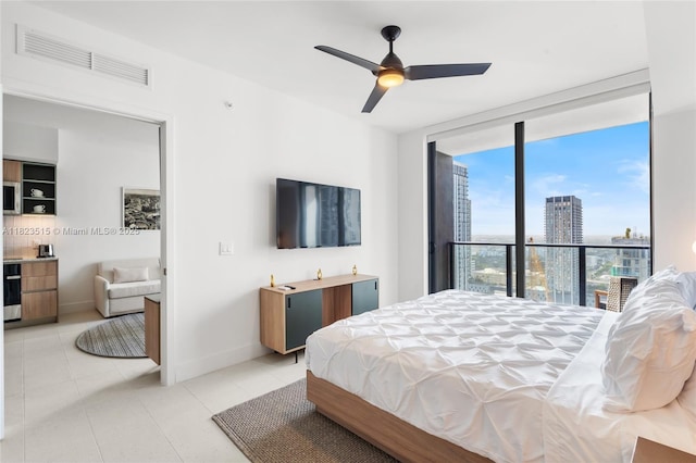 159 NE 6th St Unit 3104, Miami, FL 33132 - bedroom featuring light tile patterned flooring, expansive windows, and ceiling fan