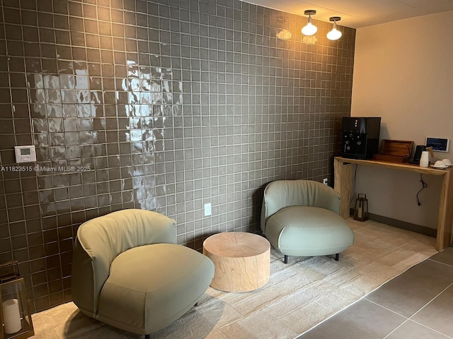 159 NE 6th St Unit 3104, Miami, FL 33132 - living area featuring tile patterned floors and tile walls