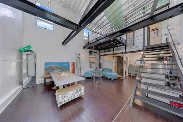 305 Jefferson Ave Unit 5, Miami Beach, FL 33139 - living room with a towering ceiling, stairs, and wood finished floors