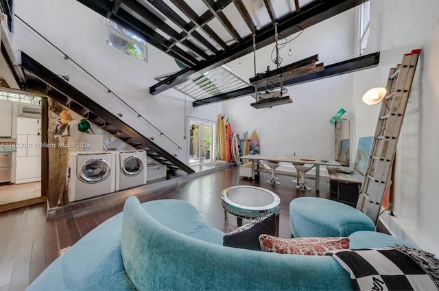 305 Jefferson Ave Unit 5, Miami Beach, FL 33139 - interior space with independent washer and dryer, a high ceiling, hardwood / wood-style flooring, and stairs