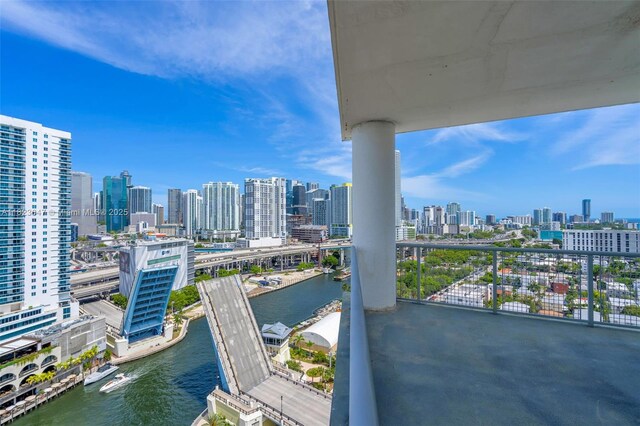 10 SW S River Dr Unit Phi03, Miami, FL 33130 - balcony with a skyline view and a water view