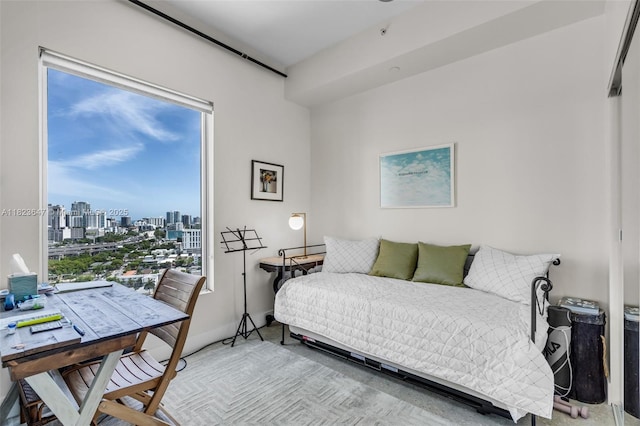 10 SW S River Dr Unit Phi03, Miami, FL 33130 - bedroom featuring a view of skyline and multiple windows