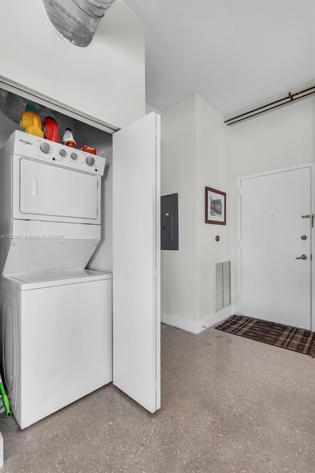 10 SW S River Dr Unit Phi03, Miami, FL 33130 - laundry area featuring stacked washer / drying machine and electric panel