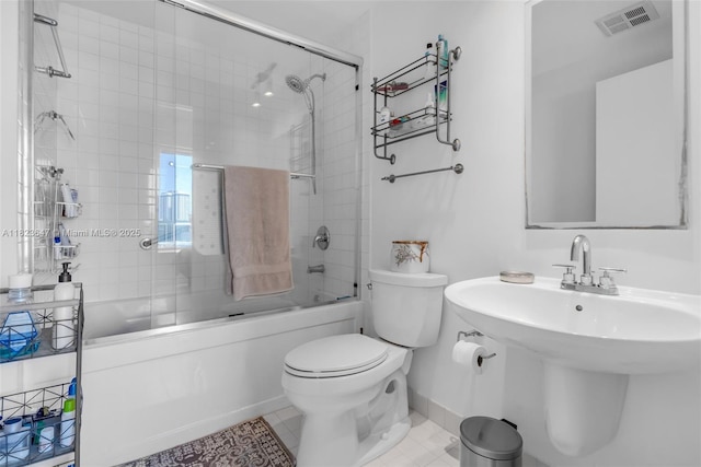 10 SW S River Dr Unit Phi03, Miami, FL 33130 - bathroom with bath / shower combo with glass door and tile patterned flooring
