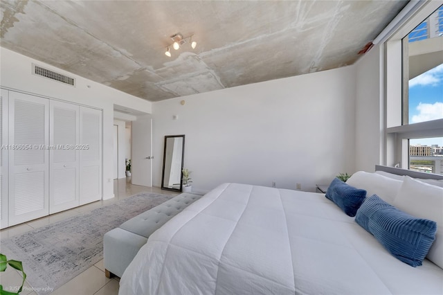 3250 NE 1st Ave Unit 1007, Miami, FL 33137 - tiled bedroom with a closet