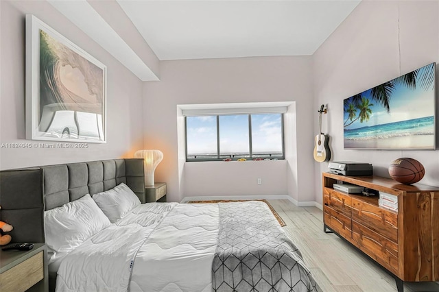 480 NE 31st St Unit 4804, Miami, FL 33137 - bedroom featuring light wood-style flooring and baseboards